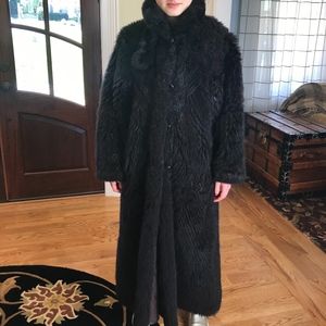 Reversible long REAL opossum fur and leather coat